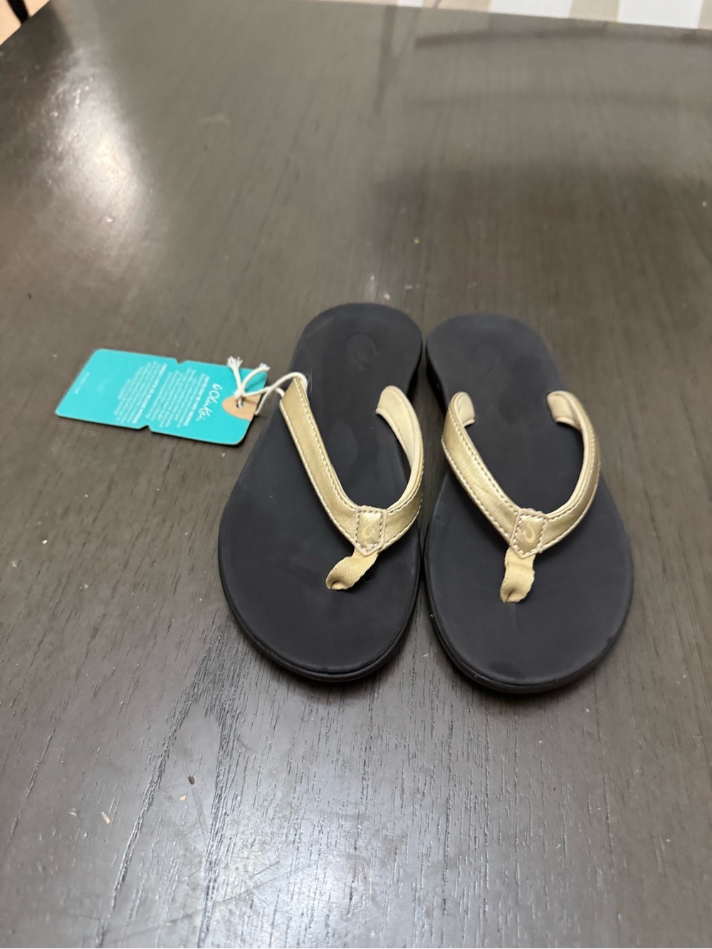 OluKai Kids Flip Flops Black Footbed withTan Straps kids or women size34eu 3us